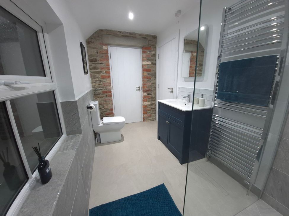 A bathroom with a sink and toilet at Annie’s Farm Cottage near Londonderry, Northern Ireland