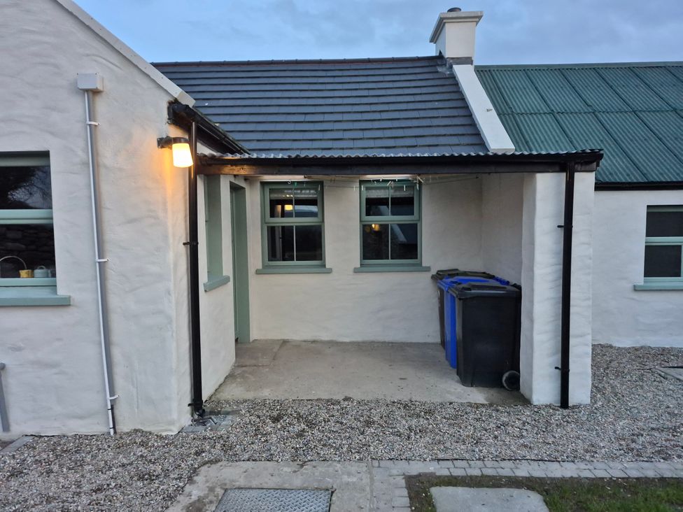 An outdoor area with bins and a pathway at Annie’s Farm Cottage Near Londonderry, Northern Ireland