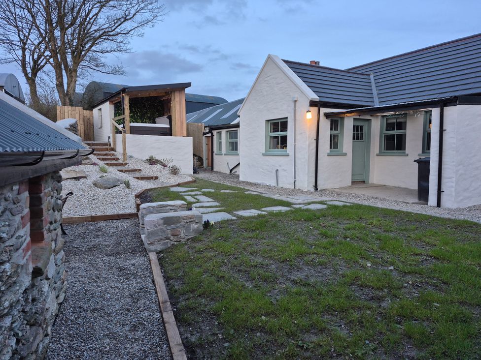 A house with a pathway and garden at Annie’s Farm Cottage Near Londonderry, Northern Ireland
