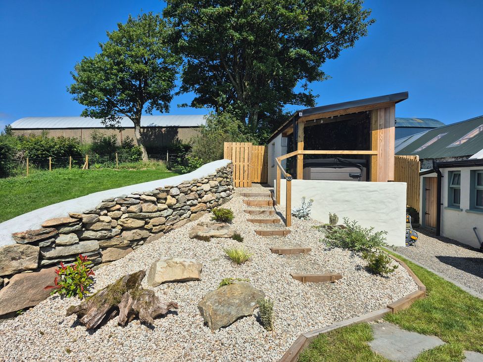 An outdoor area with steps and plants at Annie’s Farm Cottage near Londonderry, Northern Ireland