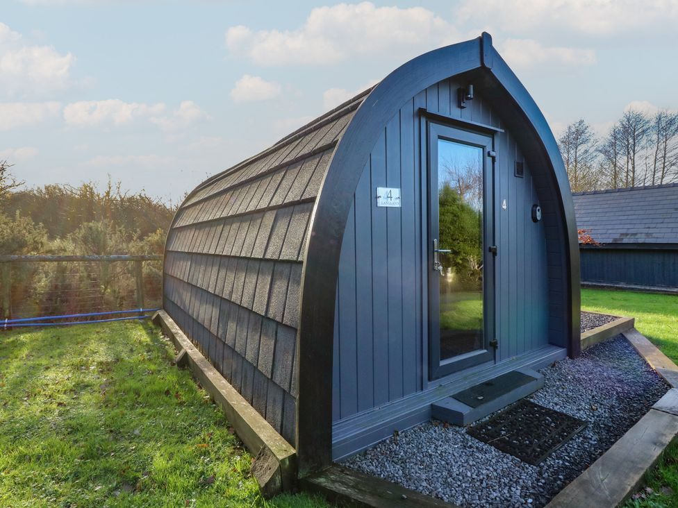 A pod with a door and window at Garden Lodge 4 in Swansea