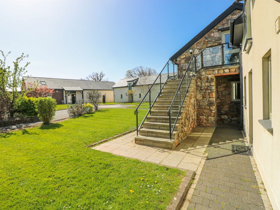 An outdoor area with stairs leading to a building at Rose Apartment in Old Walls, Llanrhidian, Gower