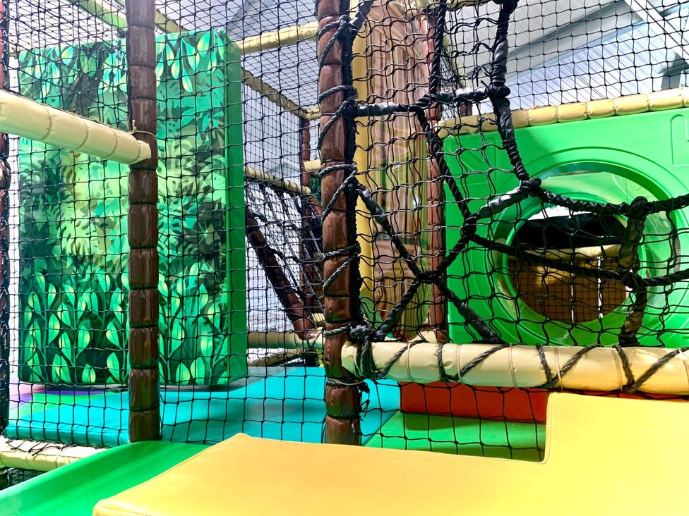 A play structure with slides and tunnels at Birch Waterside Spa Carlton Miniott near Thirsk