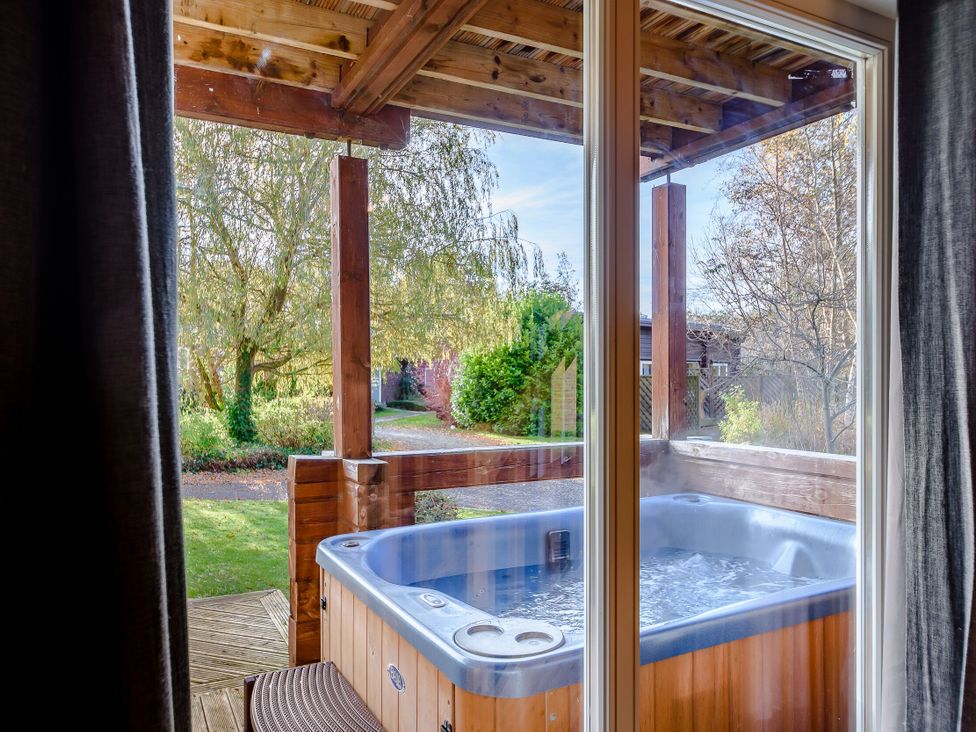 A hot tub view from a window at Birch Spa, Carlton Miniott near Thirsk