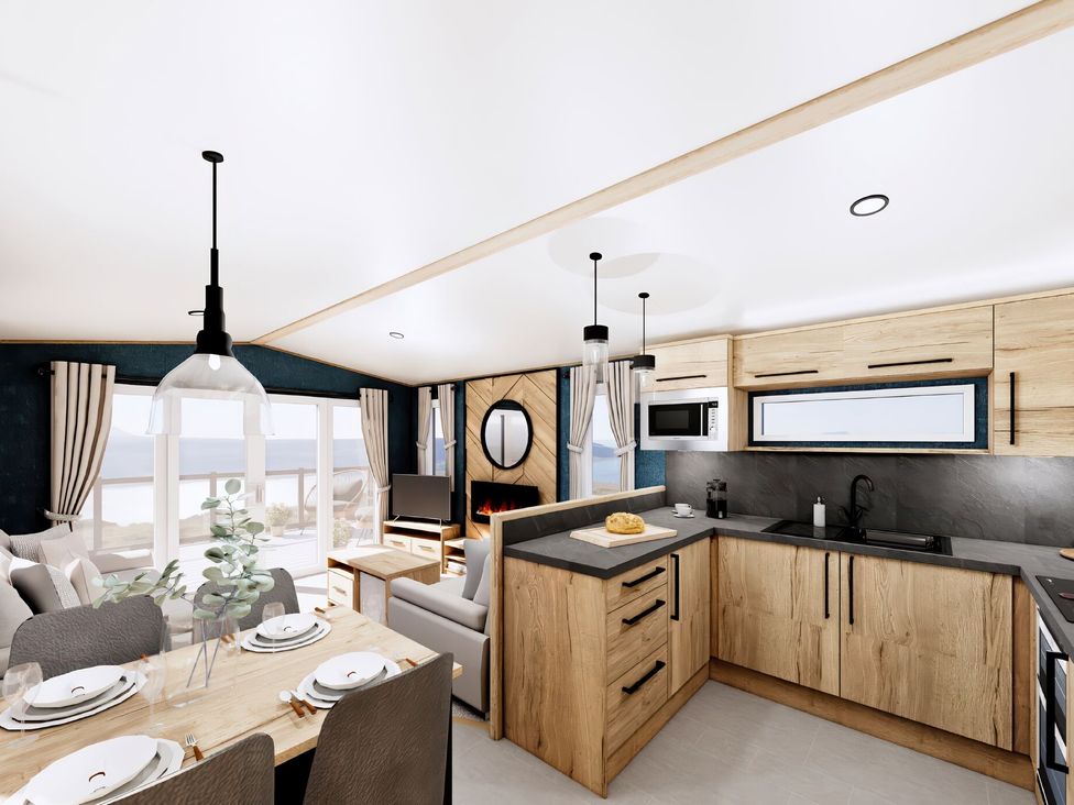 A kitchen with dining area and living space at Willow Spa Carlton Miniott near Thirsk