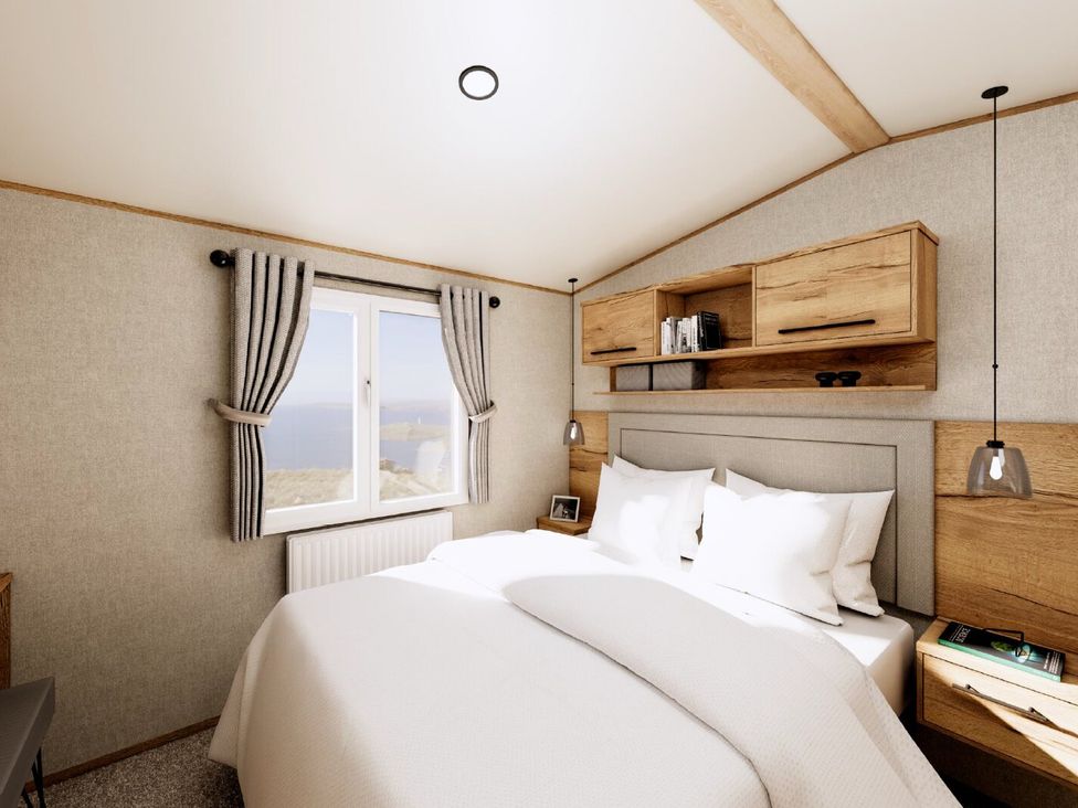 A bedroom with a bed and window at Oak Spa (Pet) Carlton Miniott near Thirsk