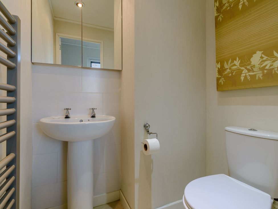 A bathroom with a sink and toilet at Cherry Tree in Carlton Miniott near Thirsk