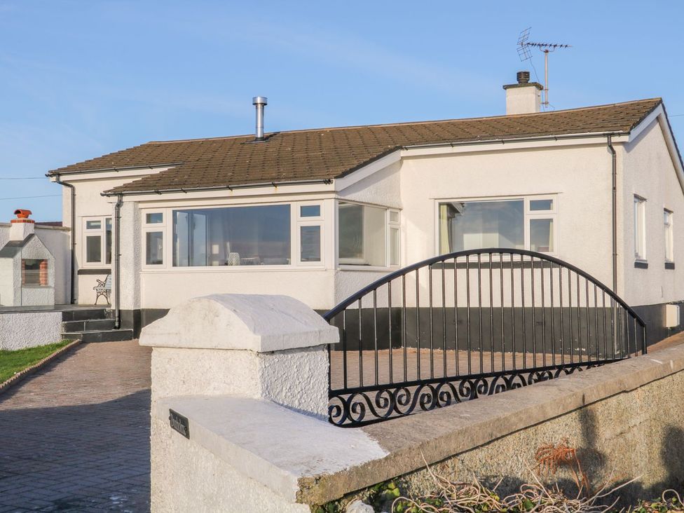 A house with a gate and pathway at Dunholme 