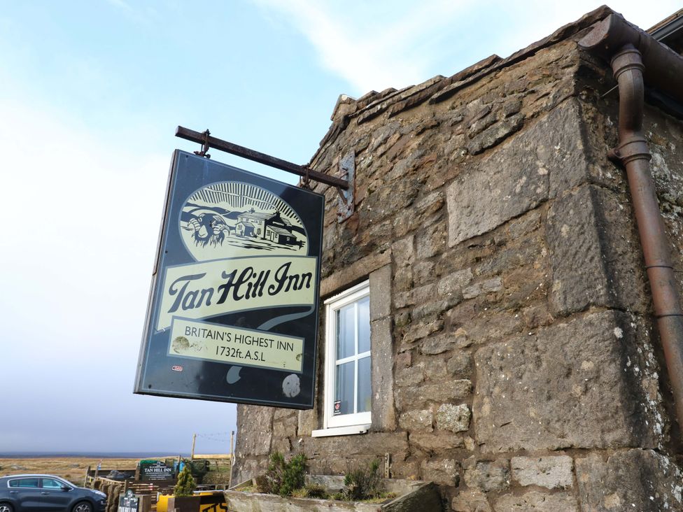 A sign for Tan Hill Inn at outdoor area near Richmond