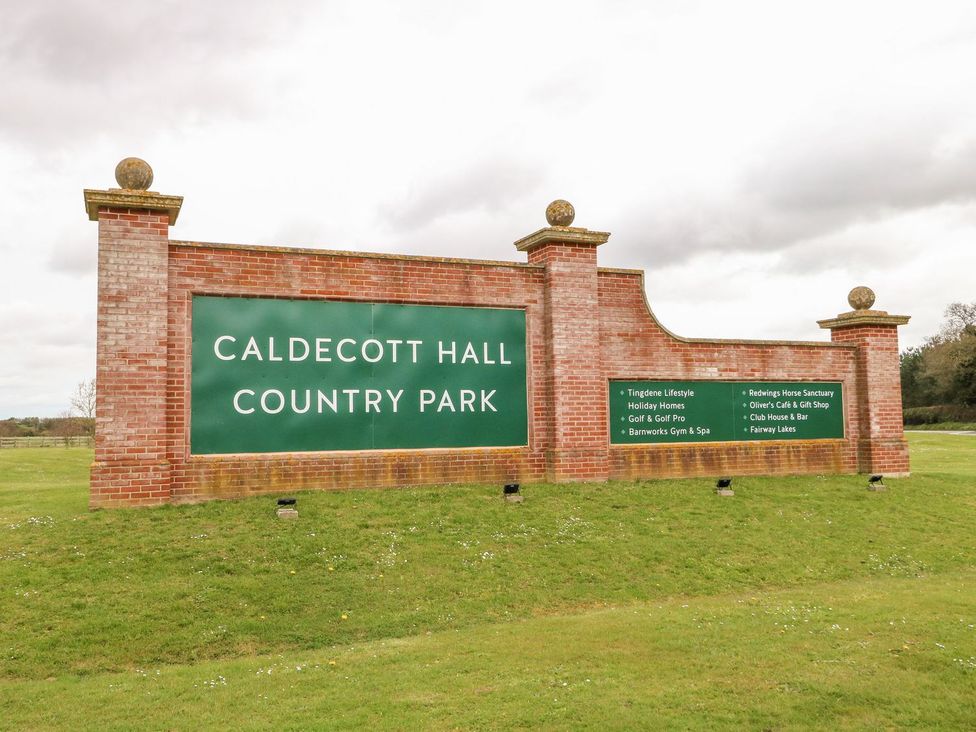 A sign for Caldecott Hall Country Park with various services listed at 46 Foxburrow Hang, Great Yarmouth