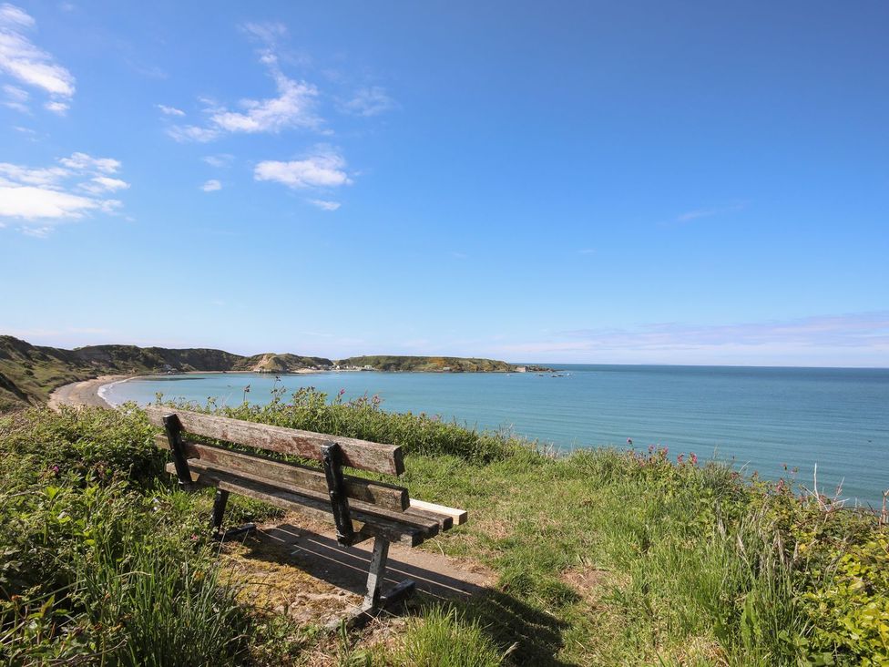 A bench overlooking the sea at Bodefi in Pwllheli