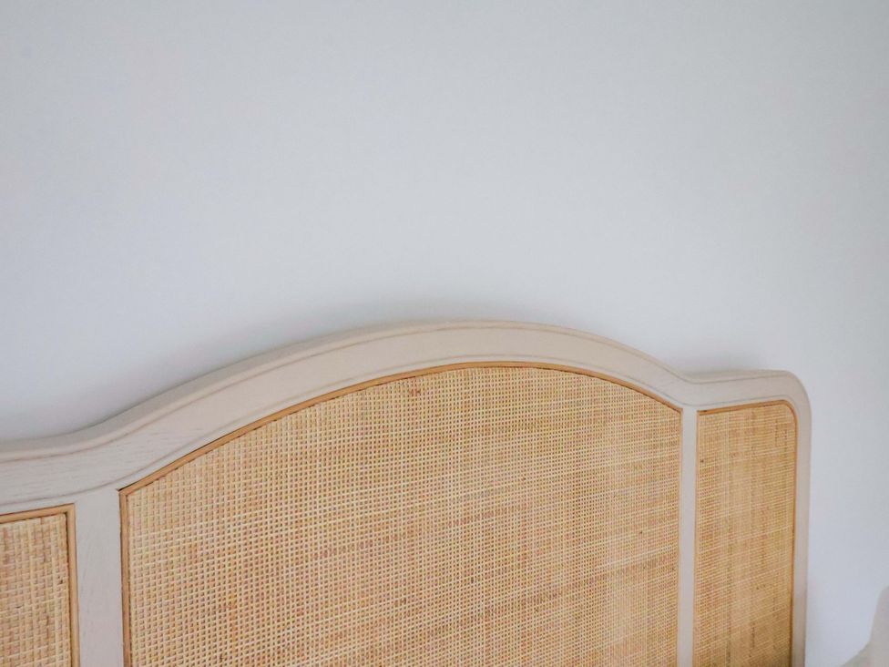 A headboard against a wall in Beachwalk Villa 3 in Whitby