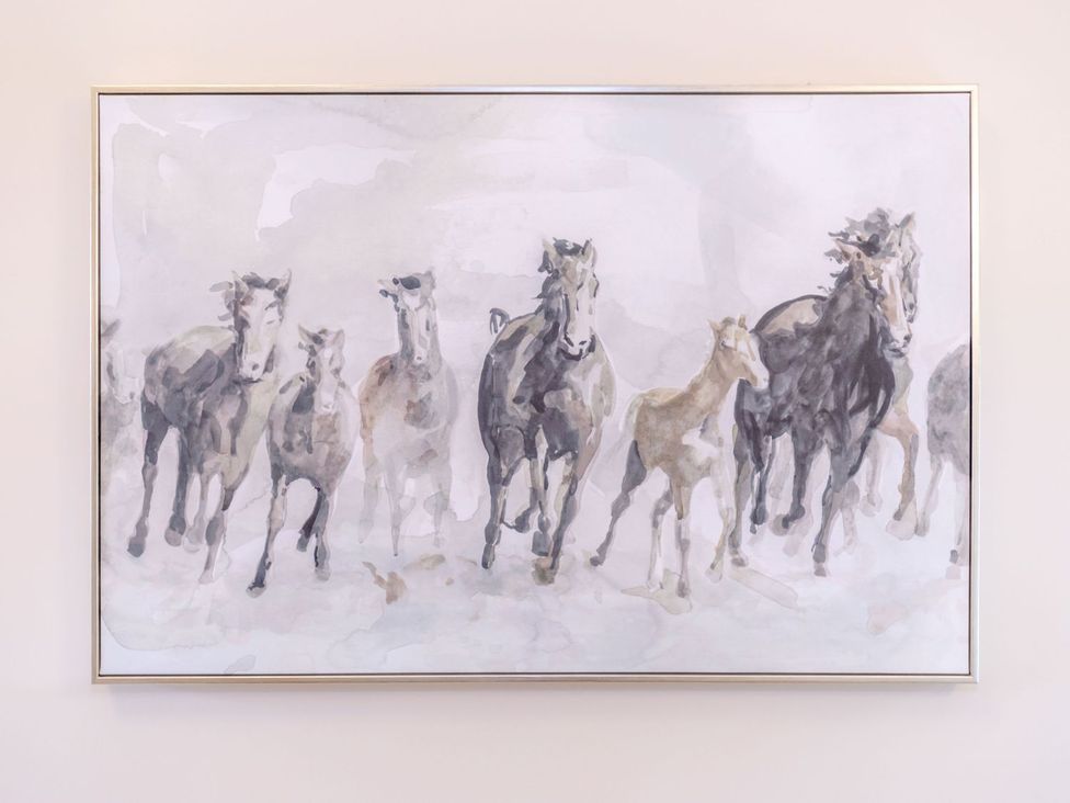 A painting of horses running at Lanes Barn, Whitby