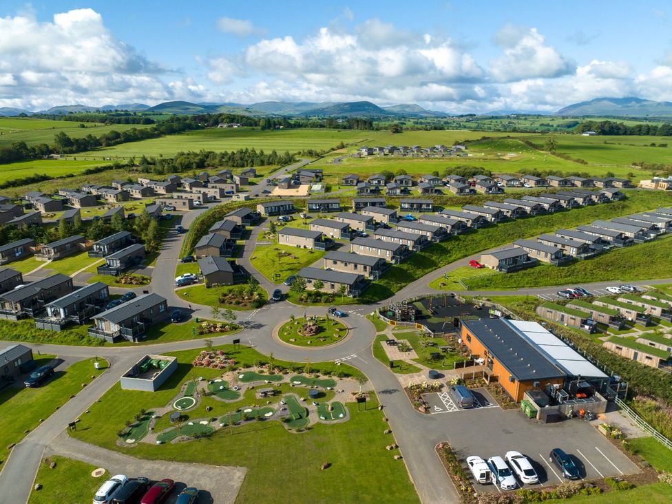 An aerial view of holiday homes and landscaping at Blencathra Family Penrith
