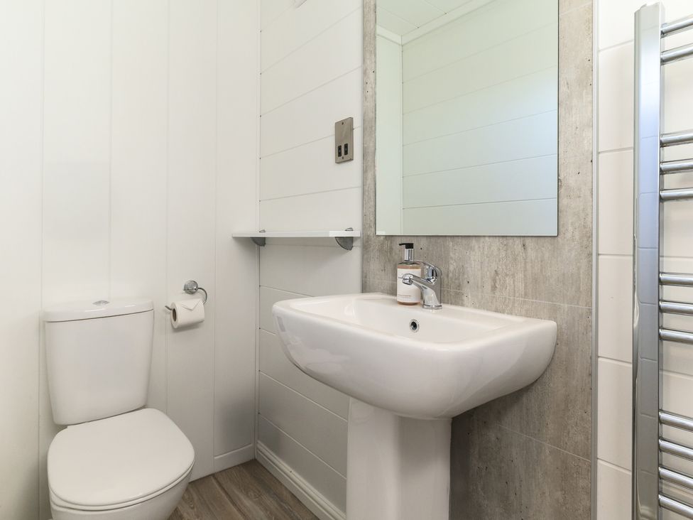A bathroom with a sink and toilet at Grasmere (Pet) Penrith