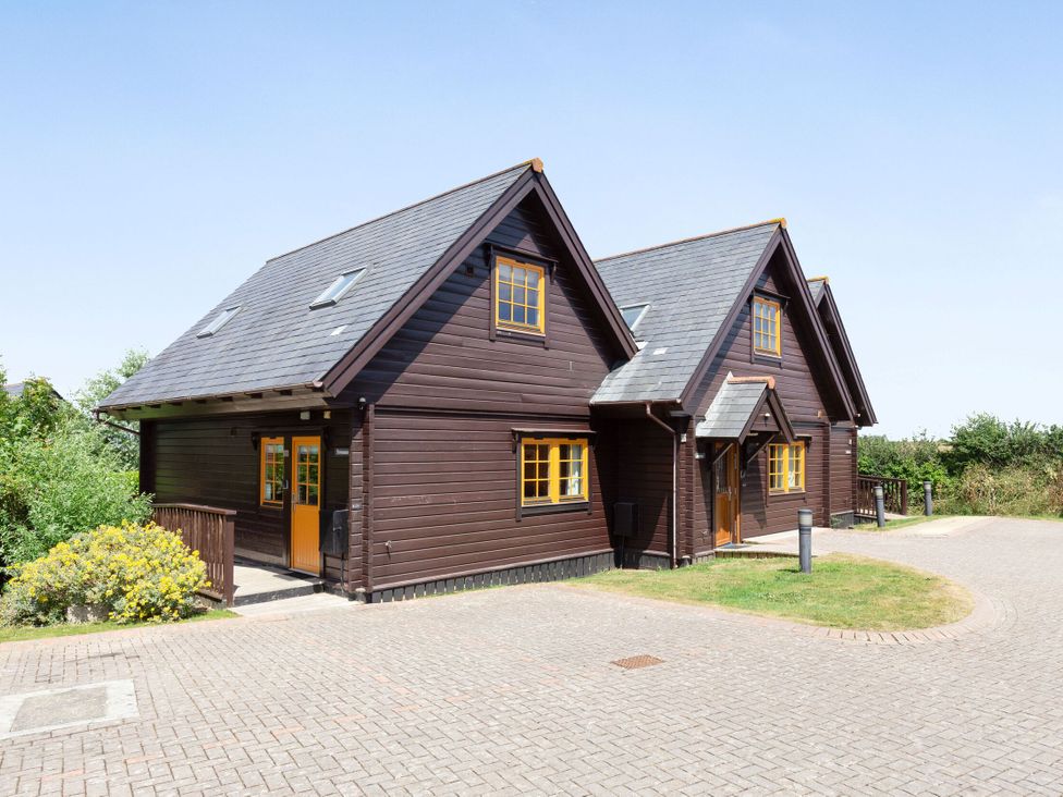 A house with a garden and pathway at Scandinavian Lodge 4 in Portreath