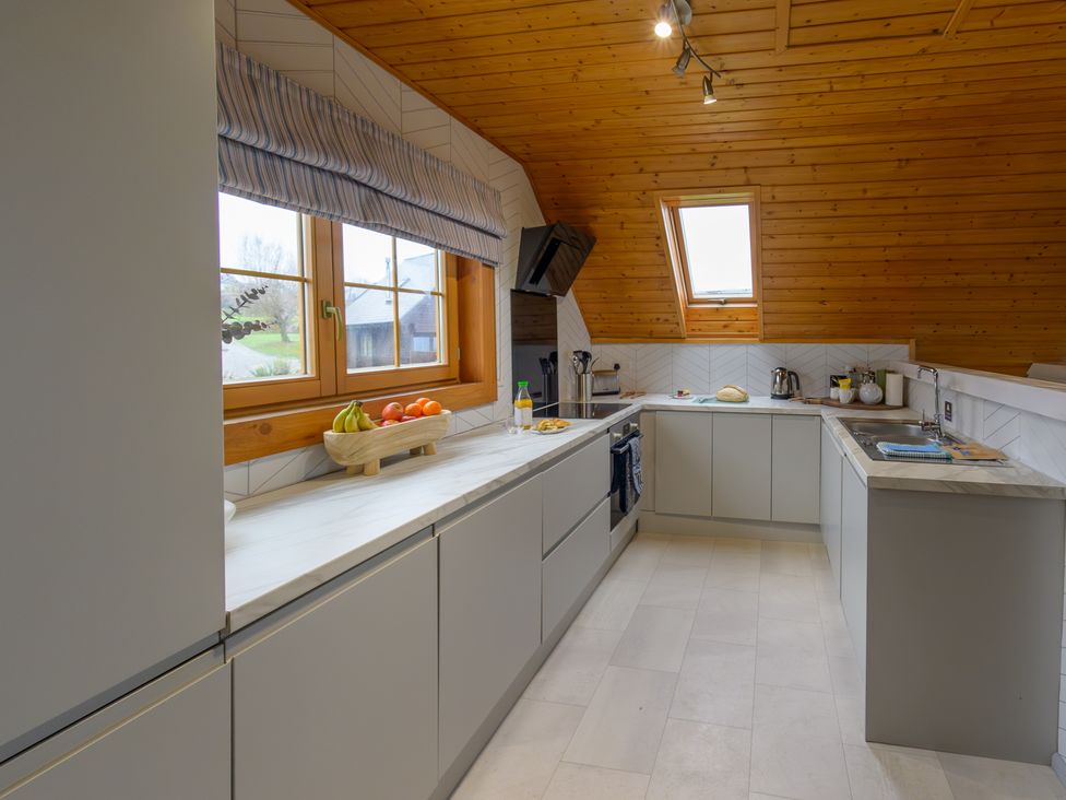 A kitchen with a sink and countertop at Senara Hot Tub Lodge (Pet) Portreath