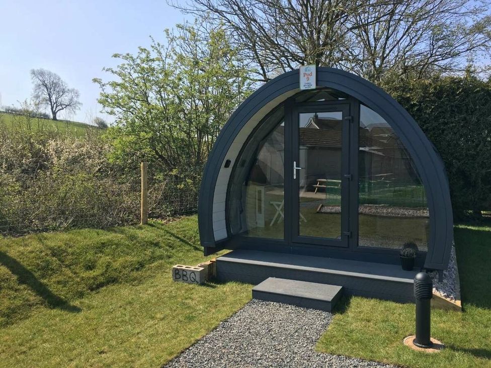 A pod with a door and steps at Pod 3 (No Pets) Carnforth