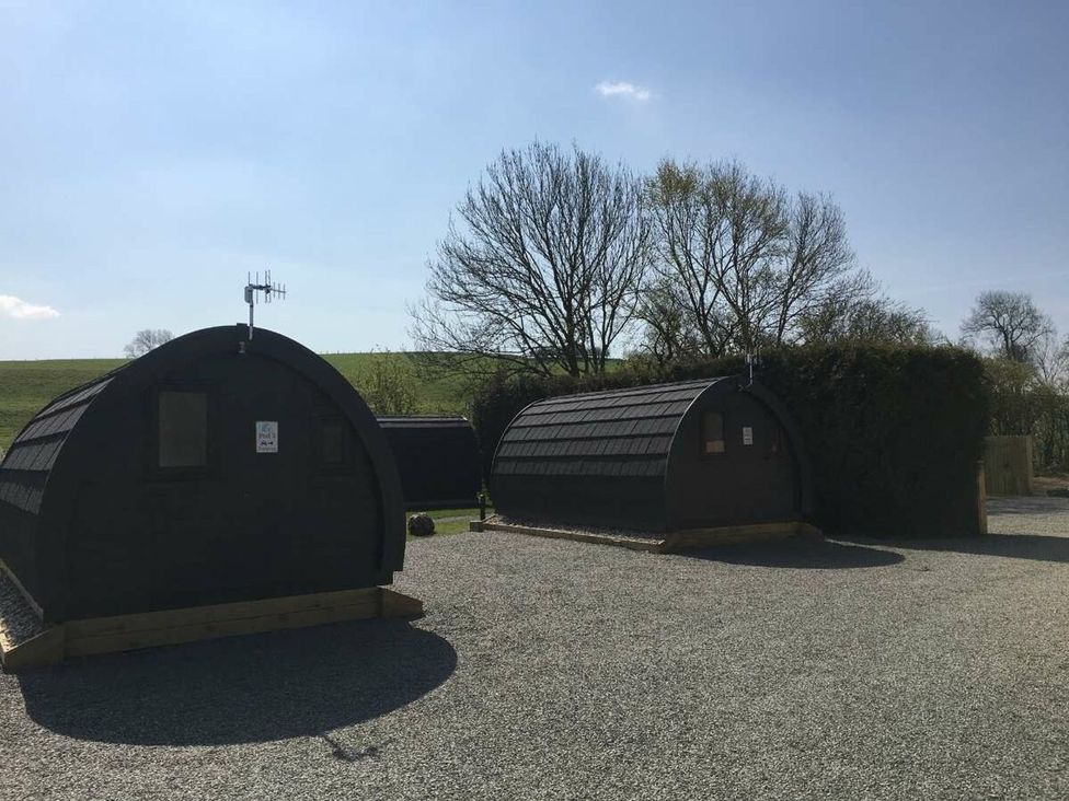 Glamping pods in an outdoor area at Pod 4 (No Pets) in Carnforth