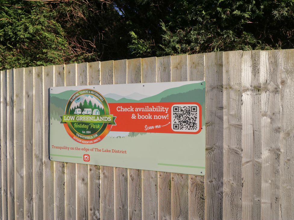 A sign for Low Greenlands Holiday Park at Tewitfield
