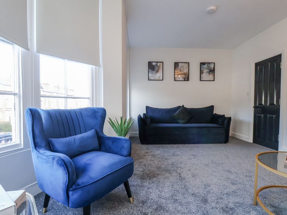 A living room with furniture in 2 bed Scarborough