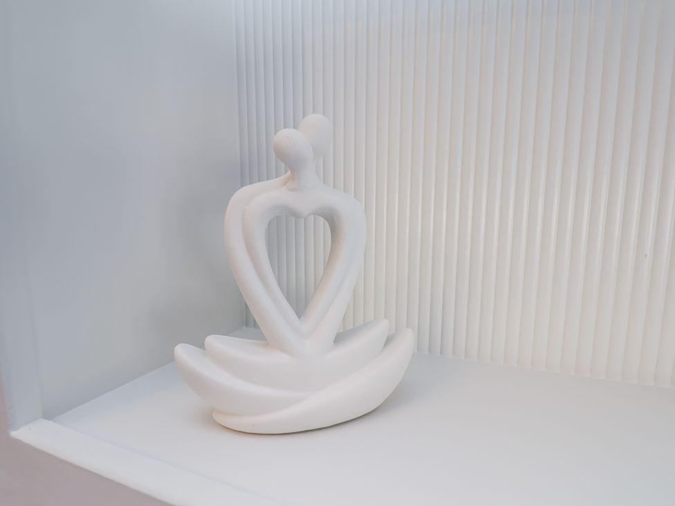 A sculpture displayed on a shelf at 2 bed in Scarborough