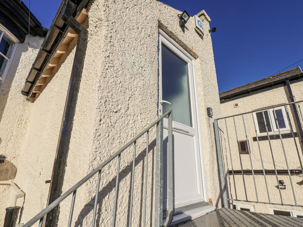 A door with a staircase at 2 bed in Scarborough