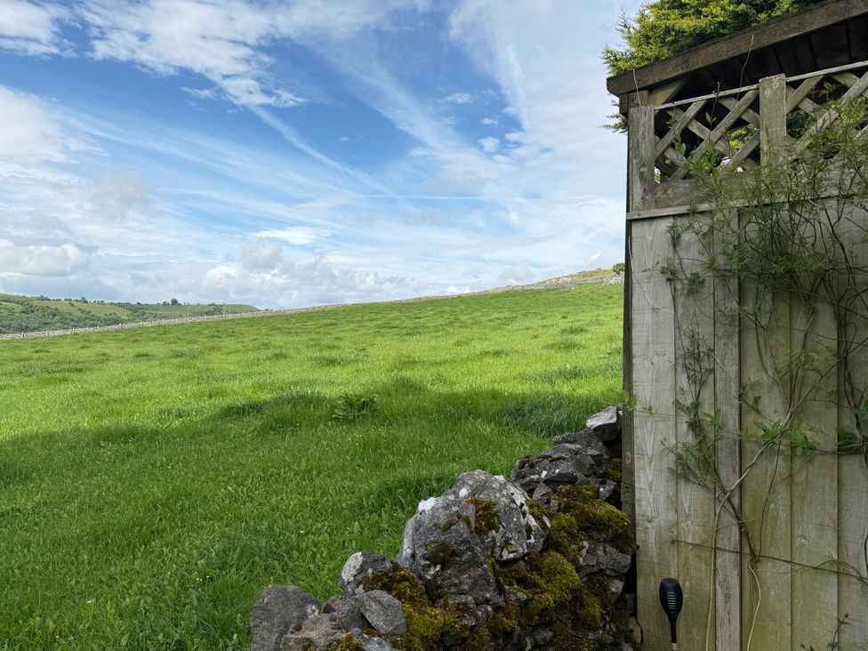 A view of a field and fence at 7 Litton Slack in Tideswell