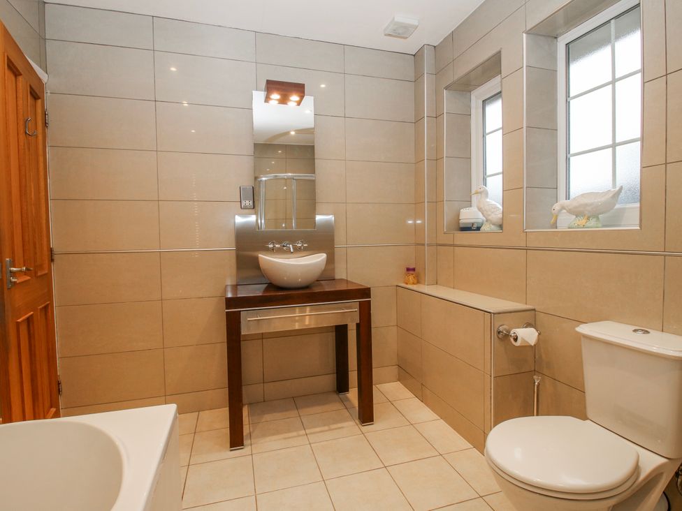 A bathroom with a sink and toilet at The Rumbles in 