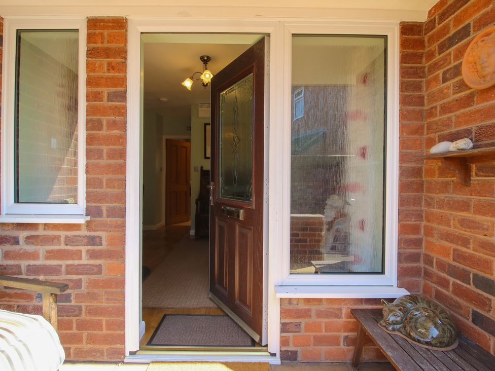 An entrance with a door and windows at The Rumbles in Ludlow