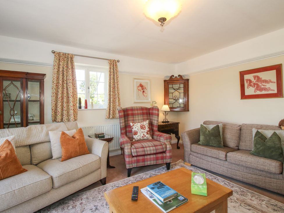 A living room with sofas and a coffee table at The Rumbles in Ludlow