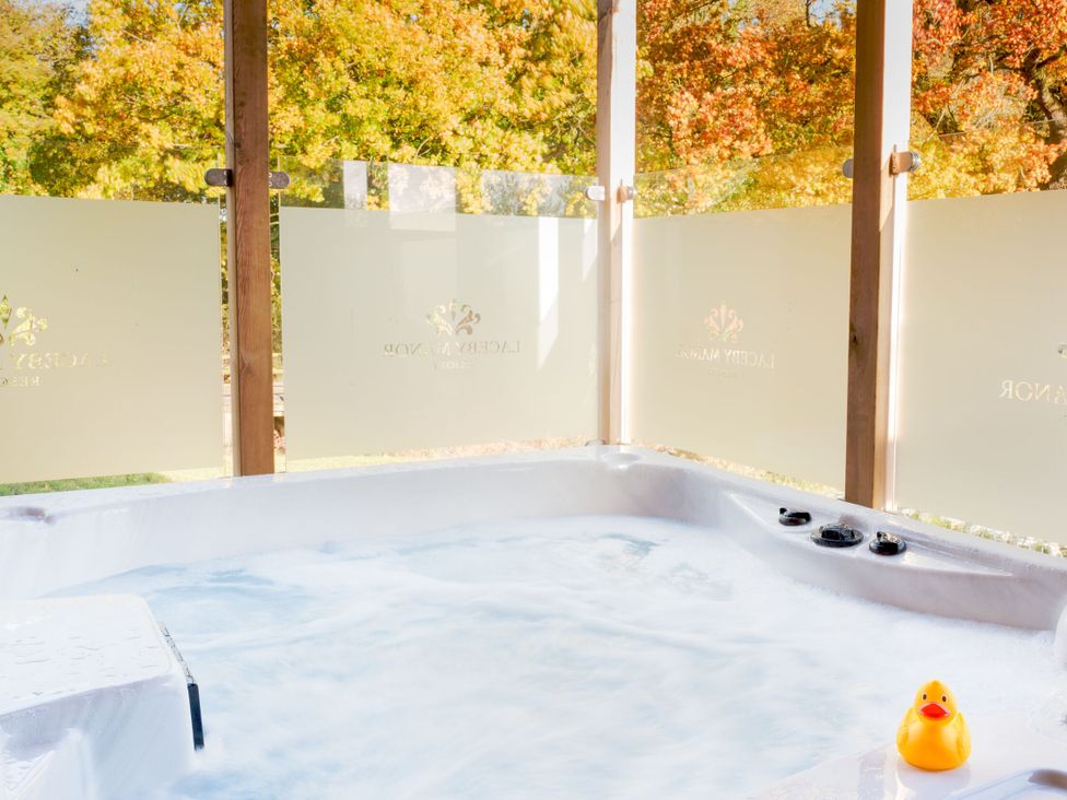 A spa with a rubber duck and glass panels at The Royal in Waltham
