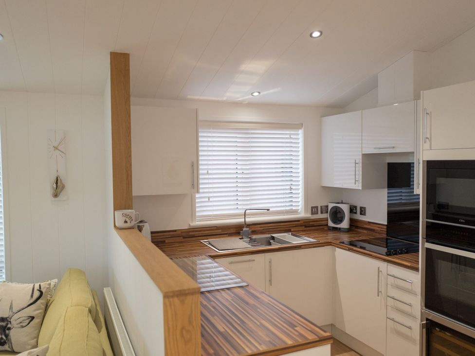 A kitchen with a sink and countertop at The Royal in Waltham