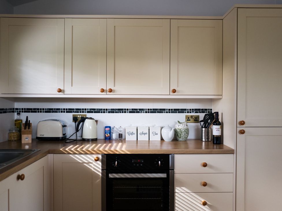 A kitchen with appliances and containers at Macosi in Waltham