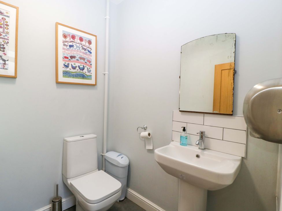 A bathroom with a sink and toilet at The Swan in 