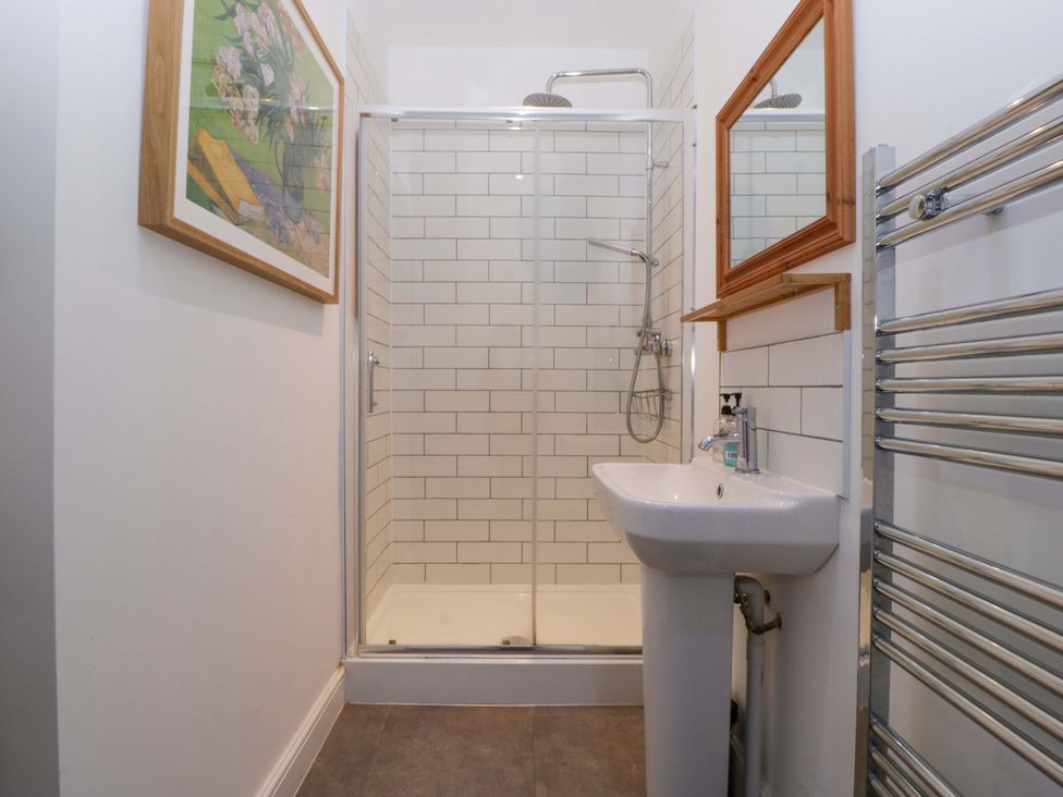 A bathroom with a shower and sink at The Swan in Whitney-On-Wye