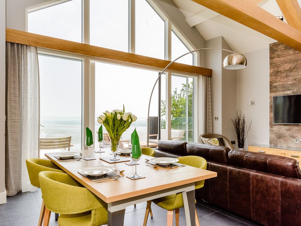 A dining room with a table and chairs at The View in Laugharne