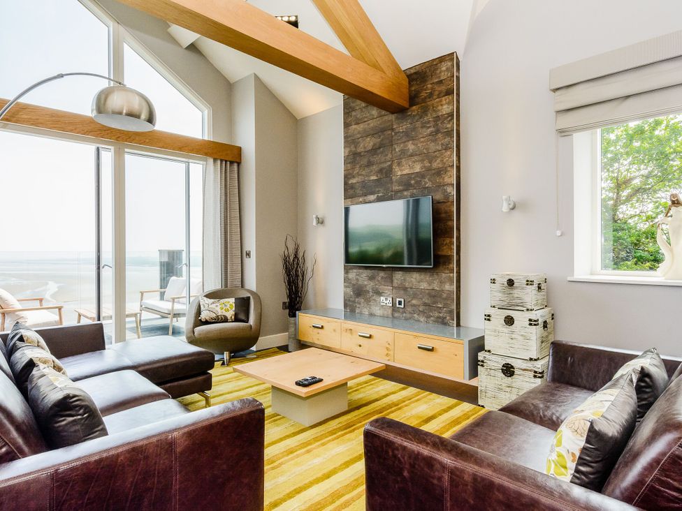 A living room with a sofa and coffee table at The View in Laugharne