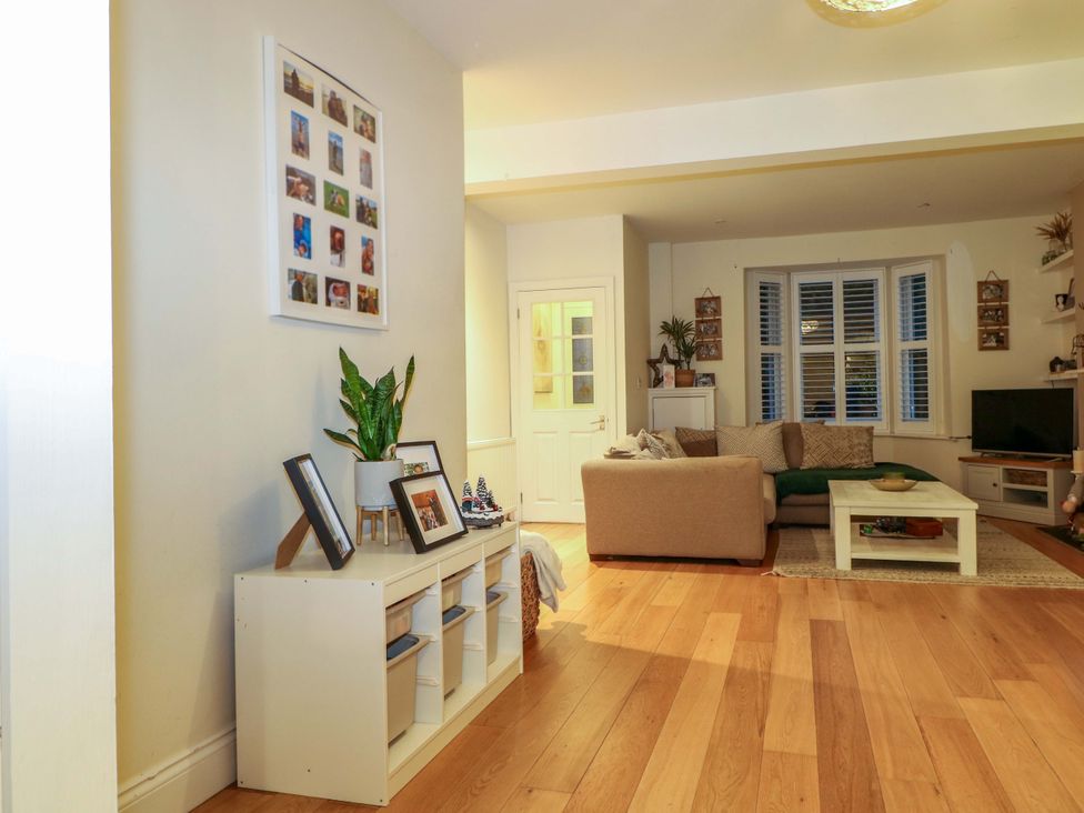 A living room with a coffee table and sofa at 213 Gordon Avenue Camberley