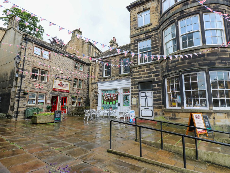 A street view with cafes and shops at Chapel House Annex in Scholes