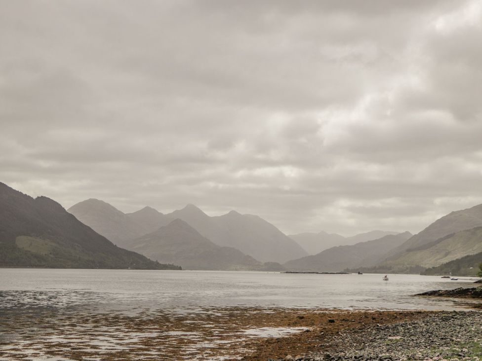 A view of mountains and water at Druidaig Lodge in Kyle