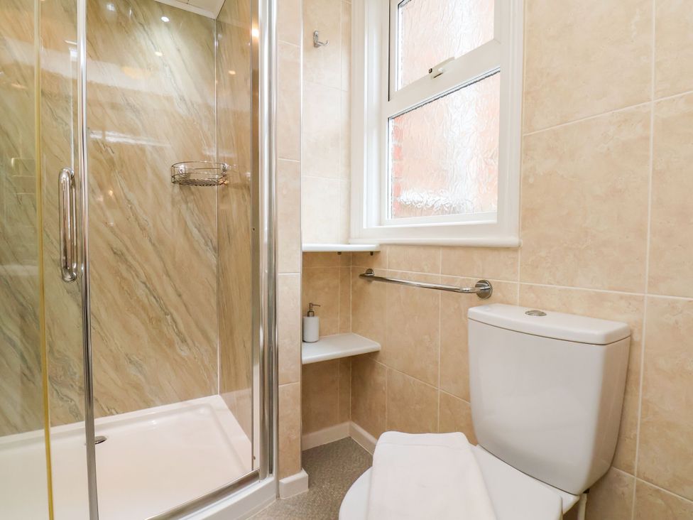 A bathroom with a shower and toilet at Sunnyvale House in Whitby