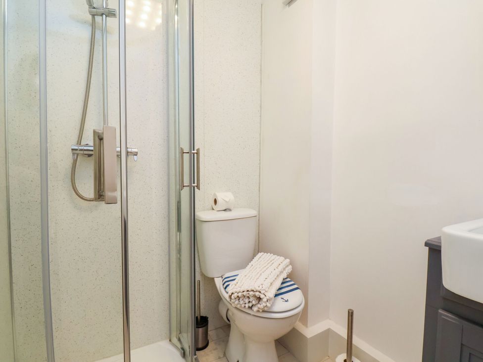A bathroom with a shower and toilet at Sunnyvale House in Whitby