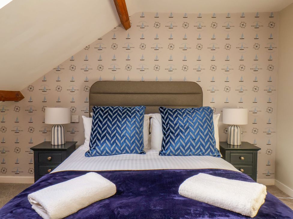 A bedroom with a bed and bedside tables at Sunnyvale House in Whitby