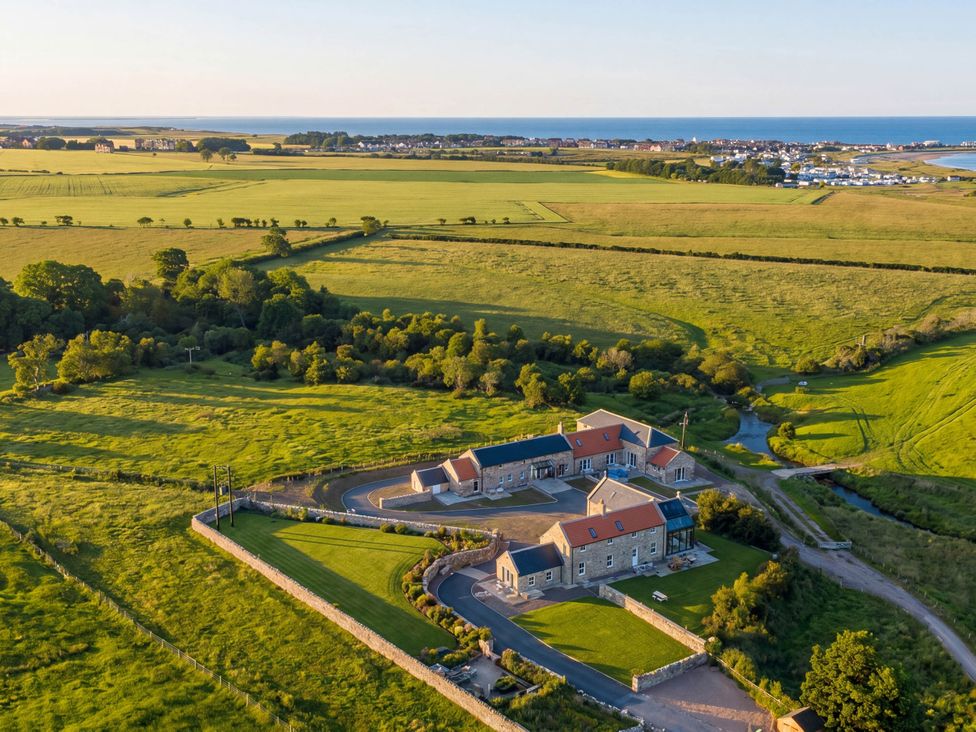 A property with a garden and adjacent fields near the coast at The Old Watermill Beadnell