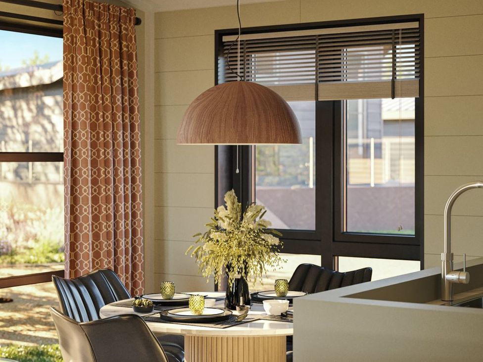 A dining room with a table set for meals at Hesk in Penrith