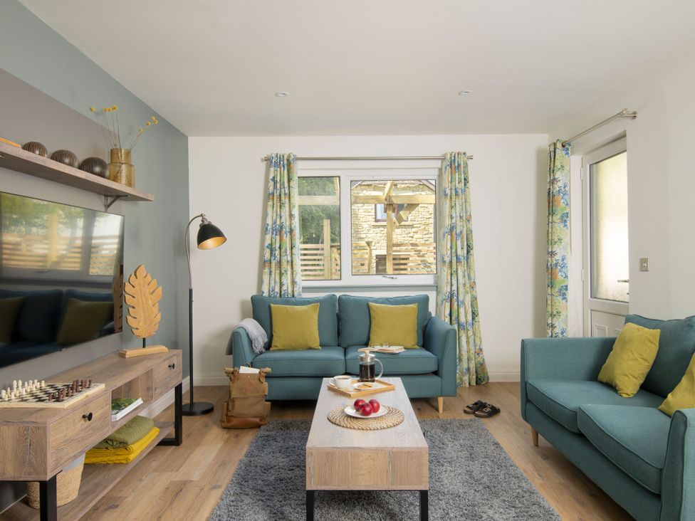 A living room with sofas and a coffee table at Patterdale (Pet) Penrith
