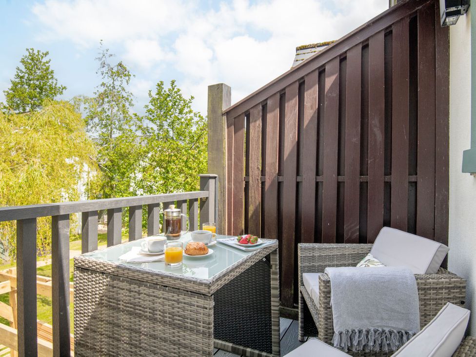 A balcony with a table and chairs at Patterdale (Pet) in Penrith