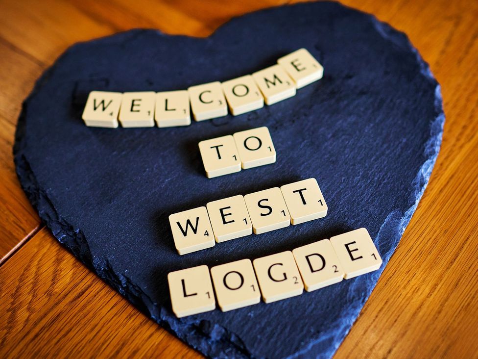 A welcome sign made of letters on a slate at West Lodge in Kirriemuir
