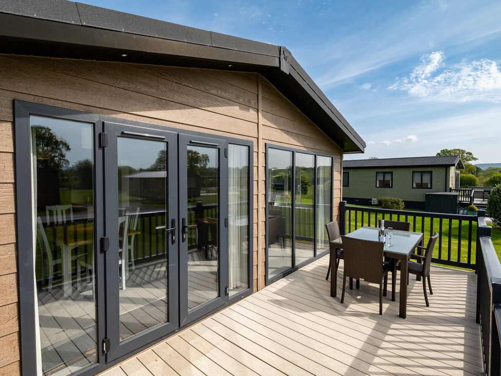 An outdoor space with a table and chairs at Greystone in Great Ayton